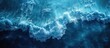 © FryArt - Aerial view of electric blue ocean waves