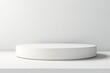 © GenBy - Minimalist white round podium against a plain background, perfect for product display and design presentations.