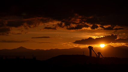 Wall Mural - Sunset over Erzurum mountains, symbolizing the end of a day, tranquility, and the beauty of nature.