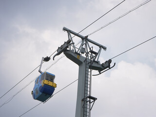 cable car with blue sky background. cable car in taman mini indonesia indah