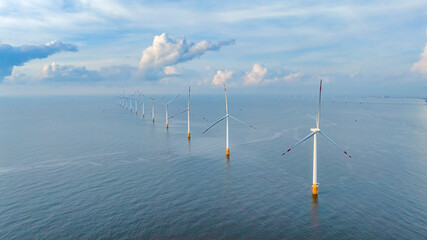 Wall Mural - panoramic view of wind farm or wind park, with high wind turbines for generation electricity with co