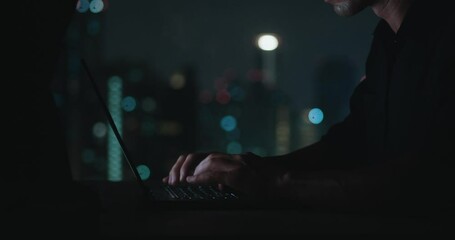 Seated at desk dead night person typing lines code laptop world of programming coding typing keyboard. Man in deep night works from home typing keyboard programming coding home office.