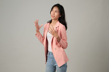 stressfull angry mad expression of asian woman wearing casual formal outfit on isolated background