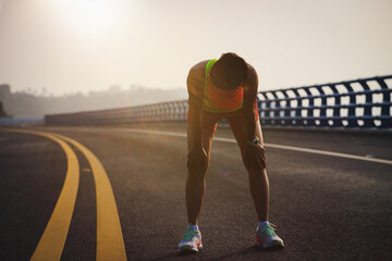 Poster - Fitness woman runner running on seaside bridge