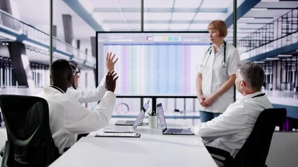 Canvas Print - Doctors Asking Questions And Voting At Medical Presentation