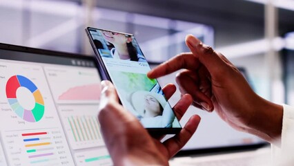 Social media entrepreneur matches users on dating app while holding smartphone