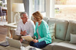 © Reese Coop/peopleimages.com - Documents, laptop and mature couple on sofa with financial report, insurance and investment in home. Retirement, marriage and senior man and woman on computer for finance, pension or internet banking