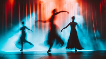 Wall Mural - Blurry silhouettes of elegant dancers gracefully moving across the stage.