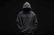 © Jam - Isolated faceless man in hoodie on black background, symbolizing hacker, thief, dark demon, mysterious creature, Halloween character, secret