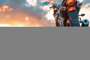 Motorcycle parked on roadside at sunset with selective focus on background scenery