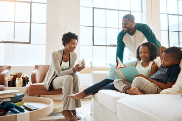 Wall Mural - Black family, reading book and children on couch with smile, care and learning for language in home. African parents, people and storytelling for connection, bonding and relax in pajamas on sofa