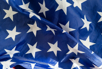 Wall Mural - Close up America flag waving with the wind for memorial day. National symbol concept.