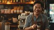 © Generative AI - Smiling male owner wearing apron holding coffee cup at cafe : Generative AI