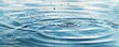 © Georgii - Serene depiction of water droplets creating ripples