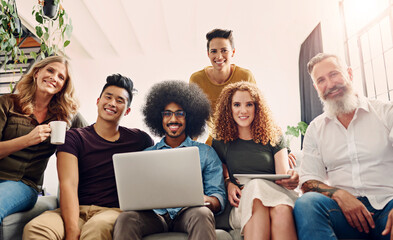 Wall Mural - Business people, group and portrait with laptop in office for meeting, collaboration and project research. Low angle, creative team and diversity with multimedia for software development in company