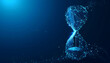 © Oleksandr06 - Electronic hourglass with space for text on a blue background
