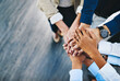 © peopleimages.com - Group, business people and hands in stack for teamwork, collaboration or diversity in workplace community. Crowd, above or solidarity at company office for staff commitment, together for support