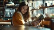 © Generative AI - Brunette haired attractive woman sitting in a caf and reading a book Smiling female wearing casual clothes Leisure activity : Generative AI