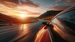 © venusvi - Modern car driving fast on mountain view road at sunset