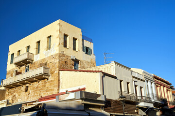 Canvas Print - Facades of historic tenement houses in the city of Chania on the island of Crete in Greece