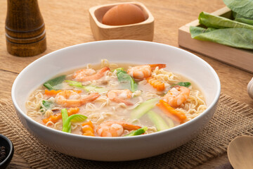 Wall Mural - Fried Instant Noodles with Shrimp and kale carrot in Gravy Sauce (rad na goong).Thai food