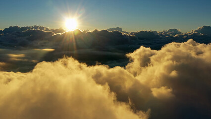 Wall Mural - aerial view of clouds and morning sun