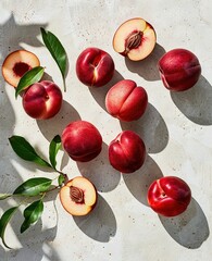 Wall Mural -   A collection of peaches resting atop a table alongside a verdant foliage plant on a pristine surface