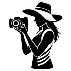 Wall Mural - On World Photography Day, a woman holding on dslr camera were hat, silhouette