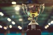© Татьяна Евдокимова - Shining gold trophy symbolizing achievement and victory, representing success and honor in a closeup view, a gleaming symbol of triumph and celebration in a competition