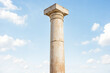 © Rysak - Stone Pillar Against a Blue Sky