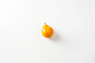 Canvas Print - Single Yellow Pear on White Background