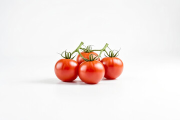 Wall Mural - Fresh Red Tomatoes on a White Background