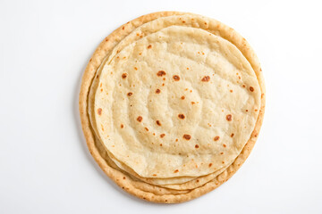 Sticker - Closeup of Stacked Tortillas on White Background