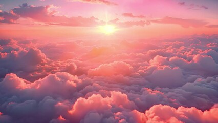 Aufkleber - A vibrant sunset casts a warm glow over a vast expanse of clouds, creating a breathtaking scene from above.