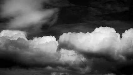 Wall Mural - time-lapse of separate white clouds on a black background have real clouds. time-lapse of a White cloud isolated on a black background realistic cloud