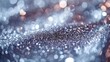© DARIKA - A close-up of a glittery silver surface with fine sparkles creating a bright, luxurious glow. The reflective texture captures the essence of modern sophistication and luxury. Abstract Backgrounds