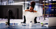 © Andrey Popov - Improving Workplace Wellness: African American Woman Suffers