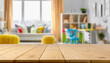 © zetrum - Empty desk for product display on defocused children room background