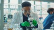 © Studio Nova - The scientist using microscope