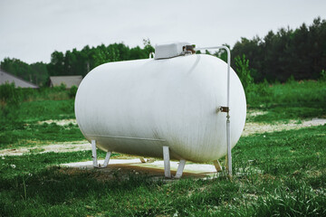 Wall Mural - Propane tank providing clean energy to countryside home