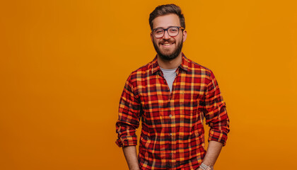 Wall Mural - A man with a red plaid shirt is smiling and has his arms crossed