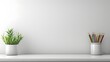 © horizon - Minimalist plain white desk with pencil pot and pencils, copy space on the right side of the frame, blank wall background, simple, minimal, clean.