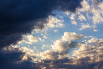 Wall Mural - cloudy weather meteorology background. cumulus clouds on the blue sky blown by the wind