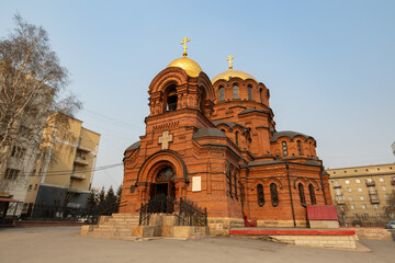 Alexander Nevsky Cathedral, Novosibirsk city, Novosibirsk region, Siberia, Russia. A beautiful brick building of the Orthodox Church. Architectural landmark of Novosibirsk.