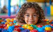 © Bartek - Cheerful Child Playing in Colorful Playroom with Building Blocks on Bright Afternoon, Happy and Creative Indoor Activity