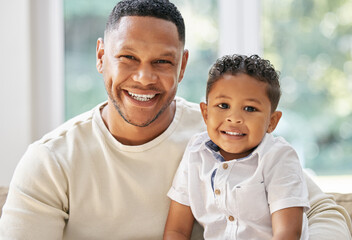 Wall Mural - Boy, father and portrait on sofa with love, smile and bonding with affection on weekend for safety or security. Dad, son and home in living room with trust or hug, together and relax with care or joy