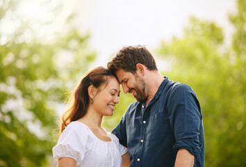 Poster - Couple, forehead touch and love in garden, connection and romance in relationship or affection. People, security and smile for commitment to marriage in outdoor nature, support and weekend date