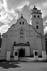 Poster - The facade of the historic Catholic parish church in Janow