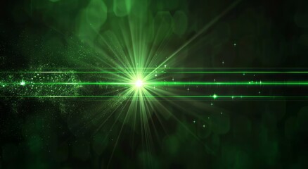 Green laser light on black background