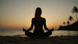 © 찬 달 - A woman meditating on yoga on a sunset beach
